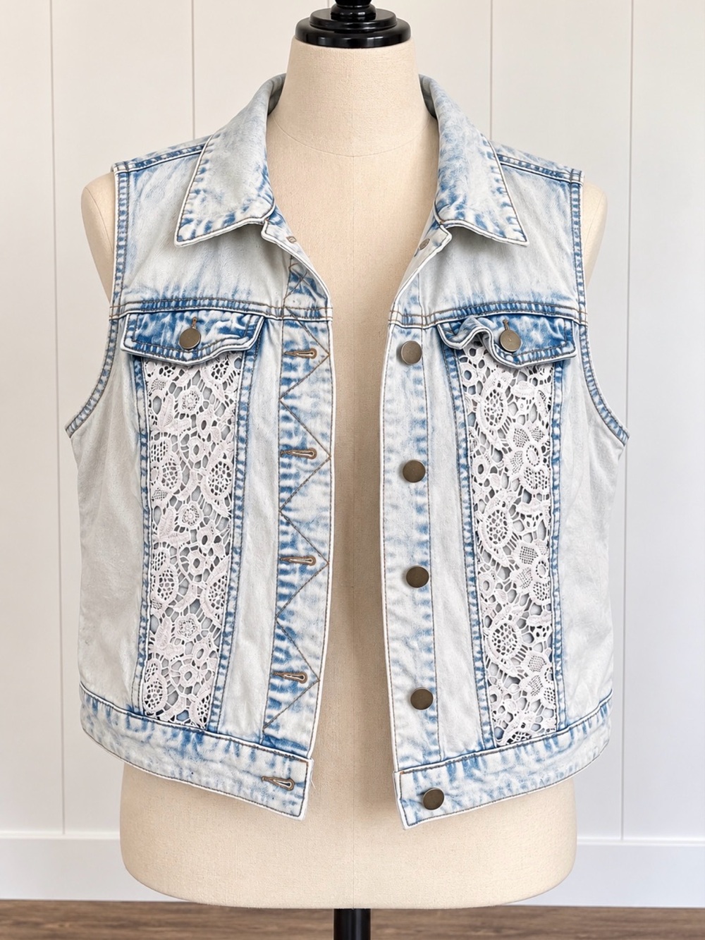 Ladies size large-light-wash denim vest with white floral lace